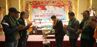 सदस्य–सचिव टंकलाल घिसिङ नेपाल राष्ट्रिय मुवाँथाई संघको साधारण सभाको उद्घाटन गर्दै